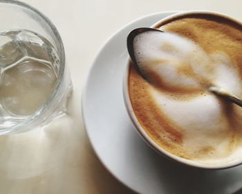 High angle view of cappuccino on table