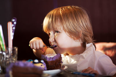 Boy eating cake