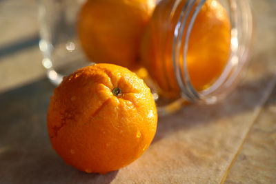 Close-up of orange fruit on table