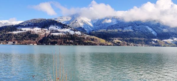 Scenic view of snowcapped mountains against sky