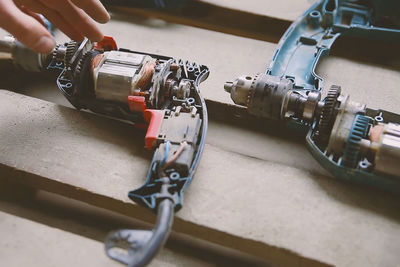 High angle view of person working on machine