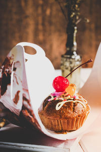 Close-up of cupcake on table