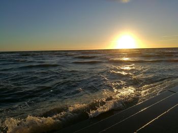 Scenic view of sea at sunset