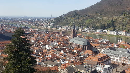 High angle view of river amidst buildings in town