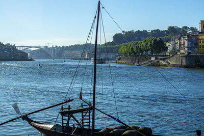 Sailboat on sea against clear sky