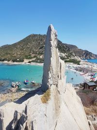 Scenic view of sea against clear blue sky