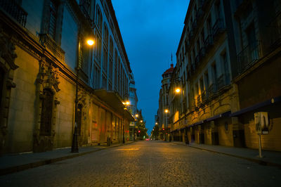 Surface level of illuminated street at night