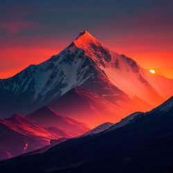 Snow capped mountains. snowy mountain peak at dawn. sunrise in mountains. mountain sunrise landscape