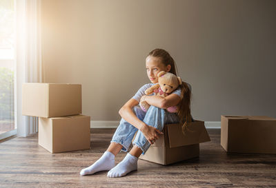 Portrait of boy holding gift box