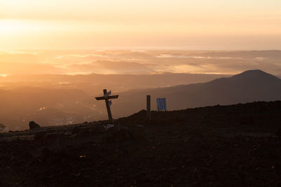 Scenic view of mountains against sky during sunset