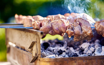 Close-up of meat on barbecue