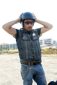 Man wearing helmet on road