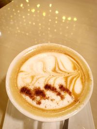 Close-up of cappuccino on table