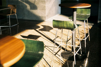 Empty chairs and table in restaurant