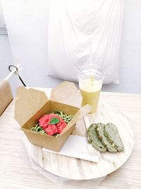 High angle view of drink in glass on table