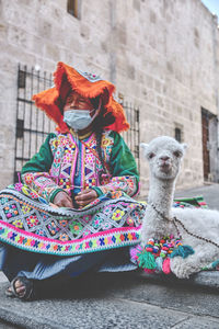 Rear view of woman with dog