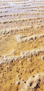 High angle view of sand on beach