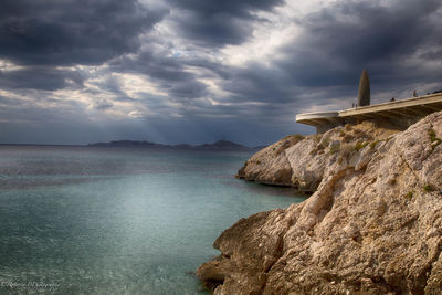 Scenic view of sea against cloudy sky