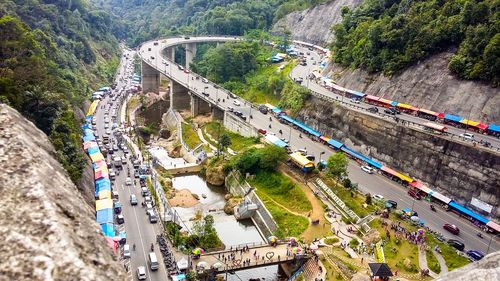 High angle view of cars on street in city