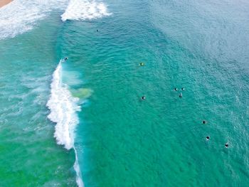 Aerial view of people in sea