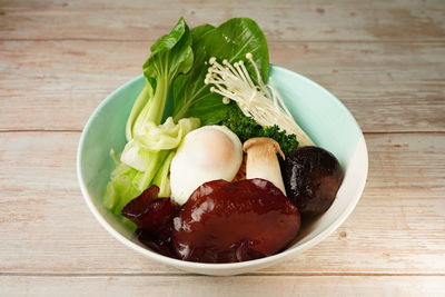 High angle view of vegetables in bowl on table