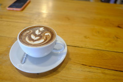 High angle view of coffee on table