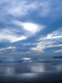 Scenic view of sea against sky at sunset