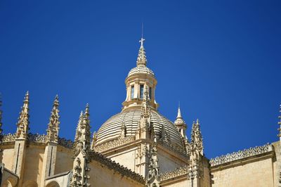 Low angle view of a building against blue sky