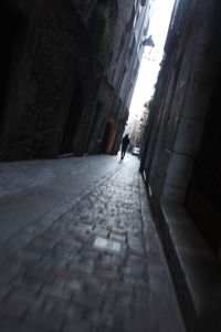 Narrow alley along buildings