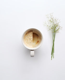 High angle view of coffee cup on table