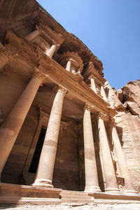 Low angle view of old ruins against clear sky