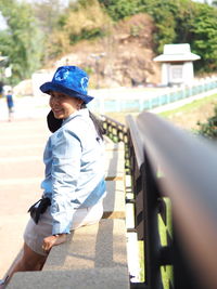 Rear view of girl wearing hat