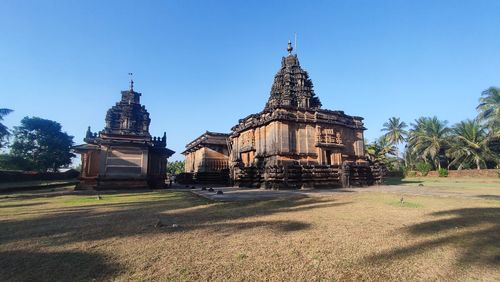 Temple against clear blue sky