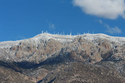 Low angle view of rocks against sky