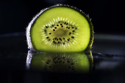Close-up of fruit against black background