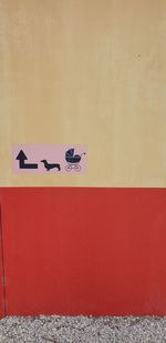 Close-up of text on wall