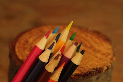 Close-up of colored pencils on table