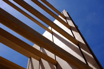 Low angle view of built structure against blue sky