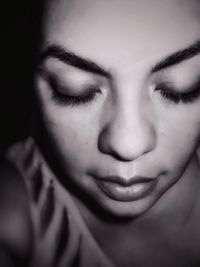 Close-up portrait of young woman