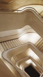 Low angle view of spiral staircase in building