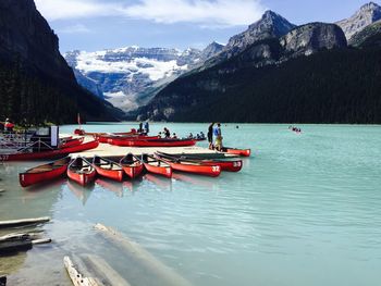 Boat in lake against sky