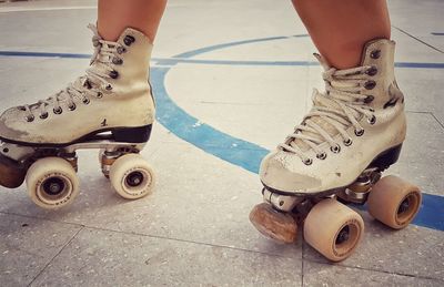 Low section of man skateboarding on skateboard