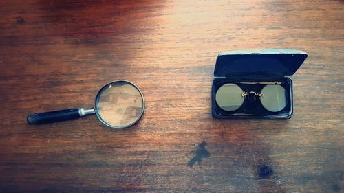 Close-up of sunglasses on table