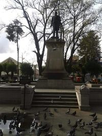 Low angle view of statue against sky
