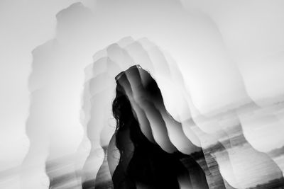 Rear view of man standing on mountain