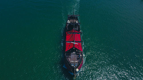 High angle view of man on boat in sea