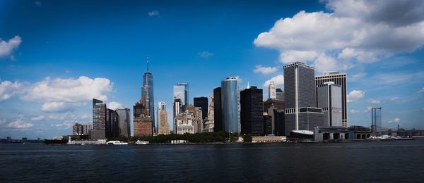 Modern buildings in city against sky