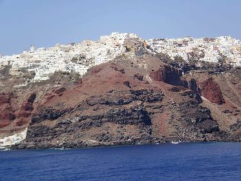 Scenic view of sea with mountains in background