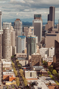 High angle view of buildings in city against sky