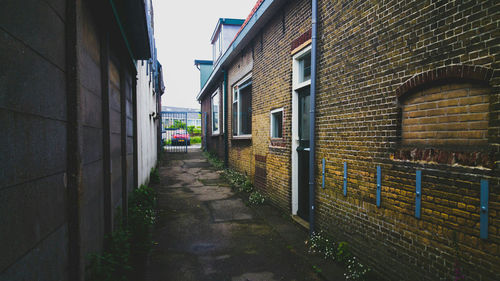 Narrow alley along buildings